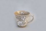 Tasse, hellgrau marmoriert mit Blumendekor